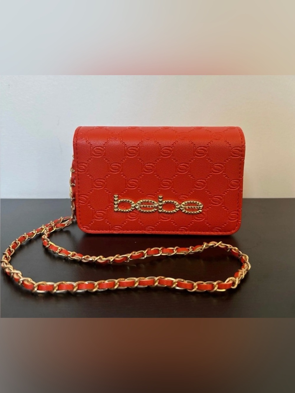 bebe Sunset Coral Celia Monogram Flap Crossbody Bag with Gold Chain